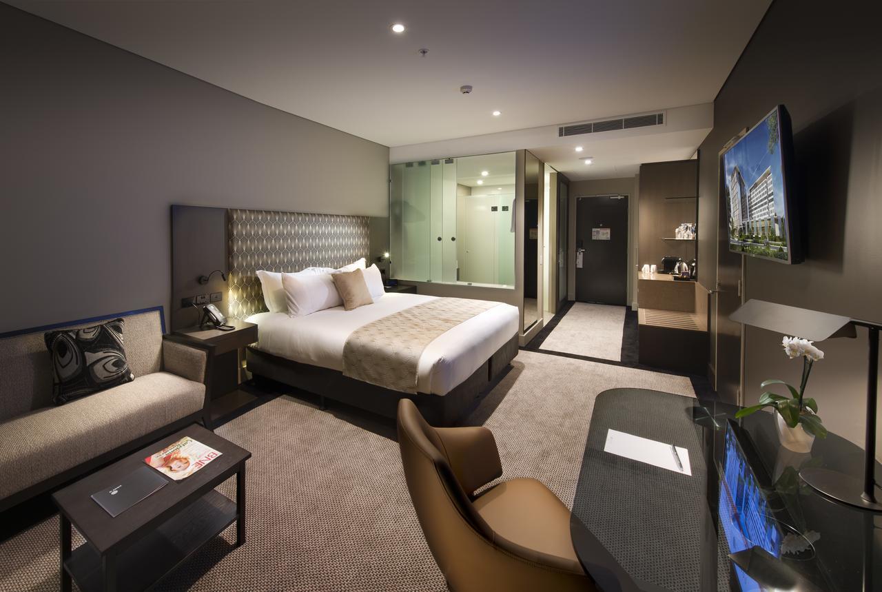 Pullman Brisbane Airport Hotel Bagian luar foto Deluxe Room