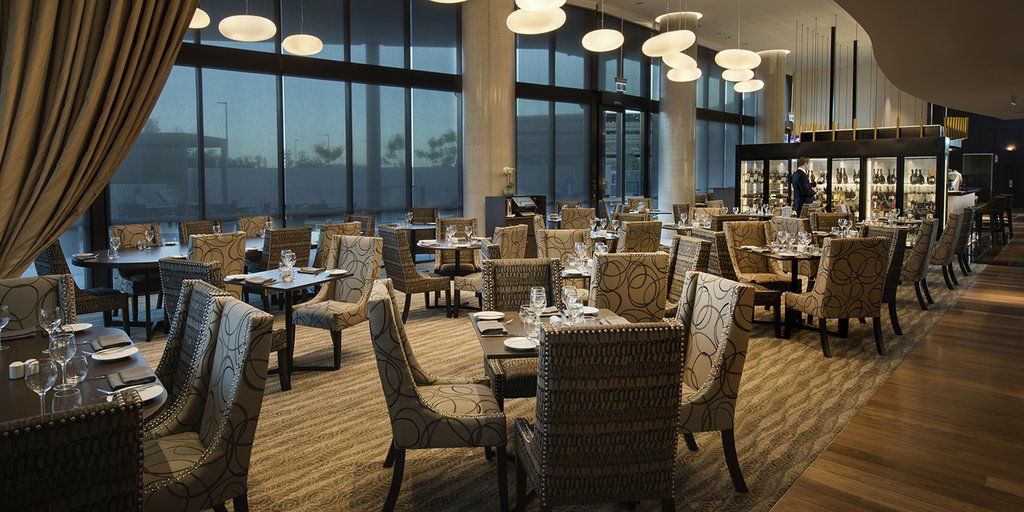 Pullman Brisbane Airport Hotel Bagian luar foto The interior of the restaurant